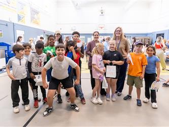 students posing as group
