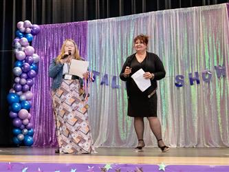 performers walking on stage to receive awards
