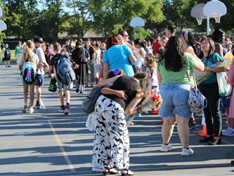 students lined up for school to start