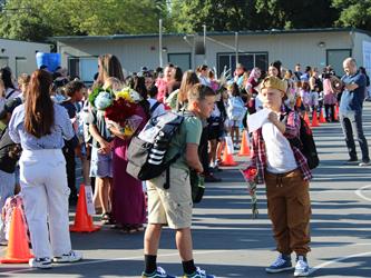 students lined up for school to start