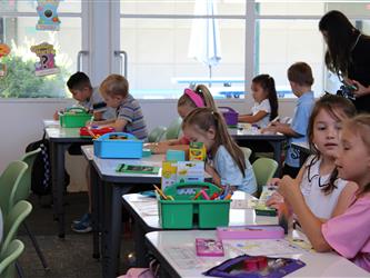 students engaged in drawing activity