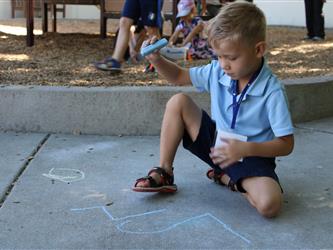 students playing hop skotch