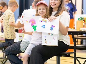 student showing drawing 