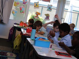 student engaged in drawing activity