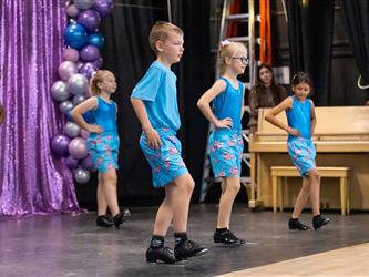 group of performers dancing