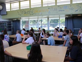 teacher addressing his class