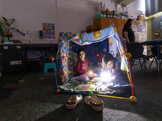 students and guests interacting with activities