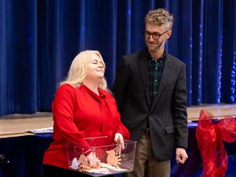 students standing on stage