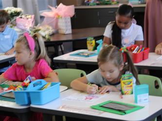 students engaged in drawing activity