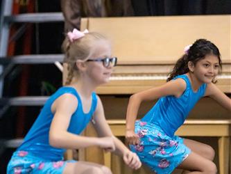 group of performers dancing