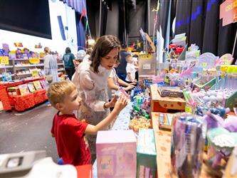 guests checking out arts and prizes on display 