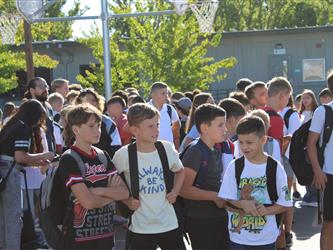 students lined up for school to start
