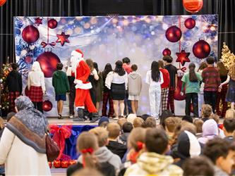 students performing on stage