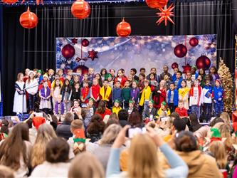 students standing on stage