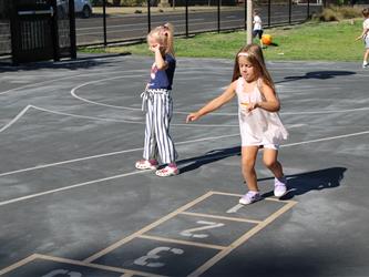 children playing on blacktop