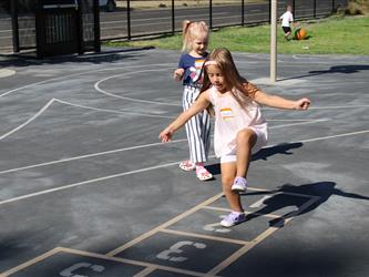 children playing on blacktop
