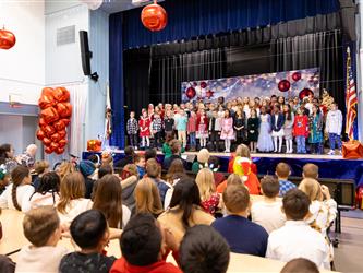 students on stage performing
