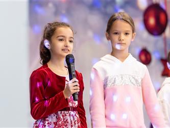 students performing on stage