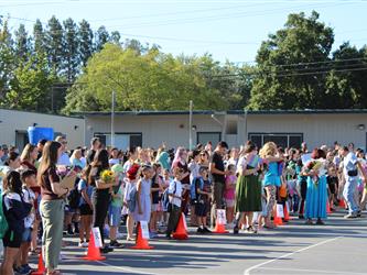 students lined up for school to start