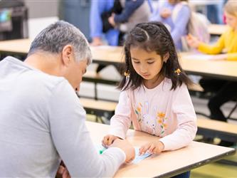 students and guests interacting with activities