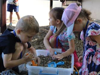 students playing hop skotch