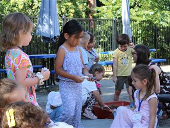 students blowing bubbles