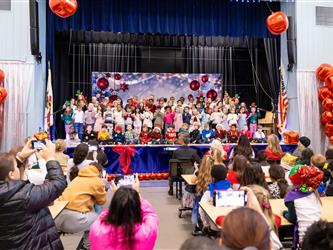 students performing on stage