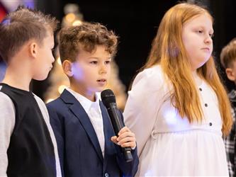 students on stage performing