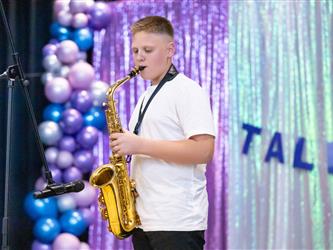 performer playing saxophone