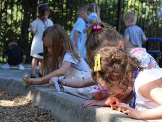 students blowing bubbles