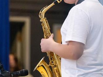 performer playing saxophone