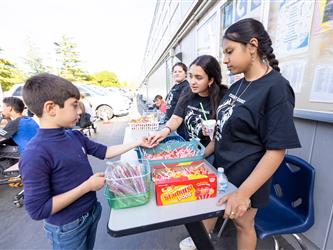 staff serving snacks and food