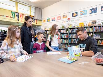 students and guests interacting with activities