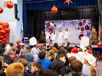 students performing on stage