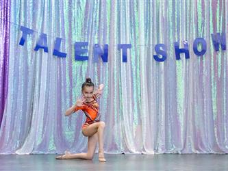 student performing gymnastics on stage