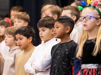 students on stage performing