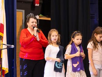 students standing on stage