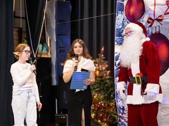 santa performing on stage
