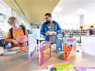 students and guests interacting with activities