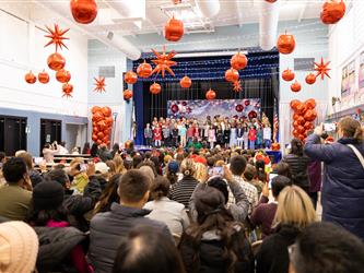 students on stage performing