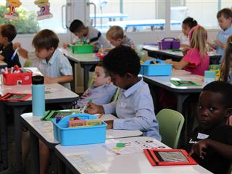 students engaged in drawing activity
