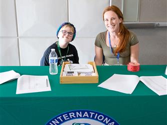 staff sitting at table