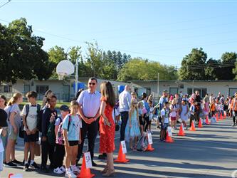 students lined up for school to start