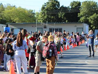 students lined up for school to start