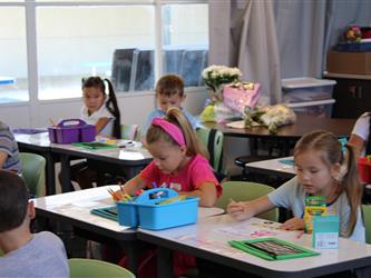 students engaged in drawing activity