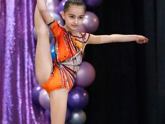 student performing gymnastics on stage