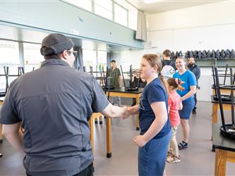 staff explaining to guests