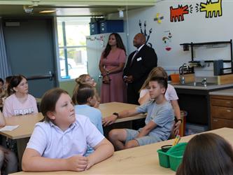 superintendent observing in back of room