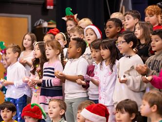 students performing on stage
