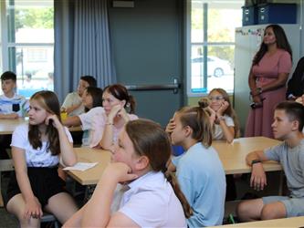 teacher addressing his class